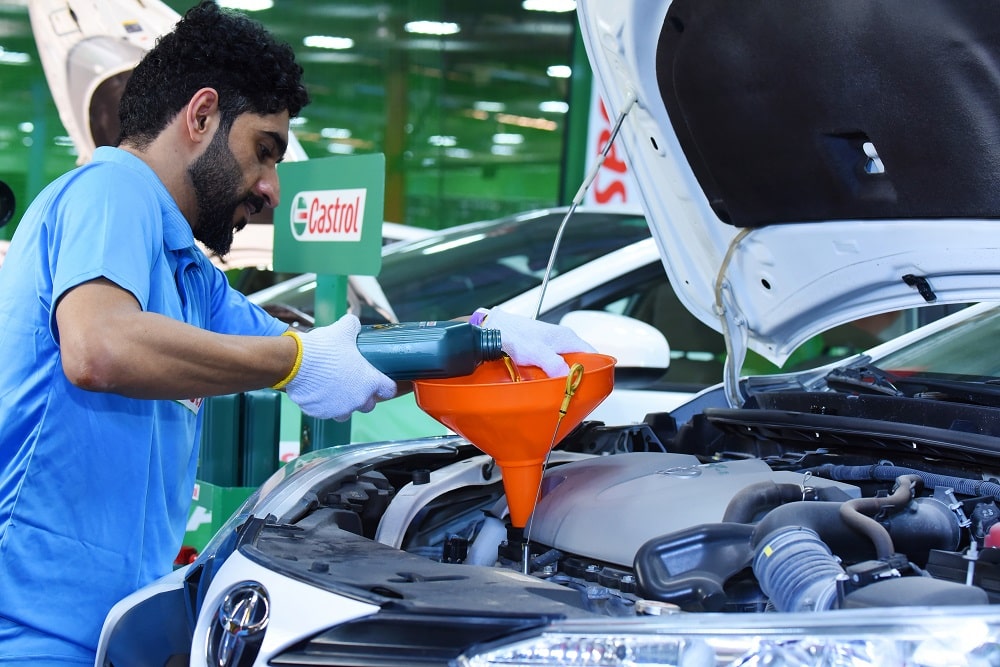 Giant orange funnel for cars engine oil pouring