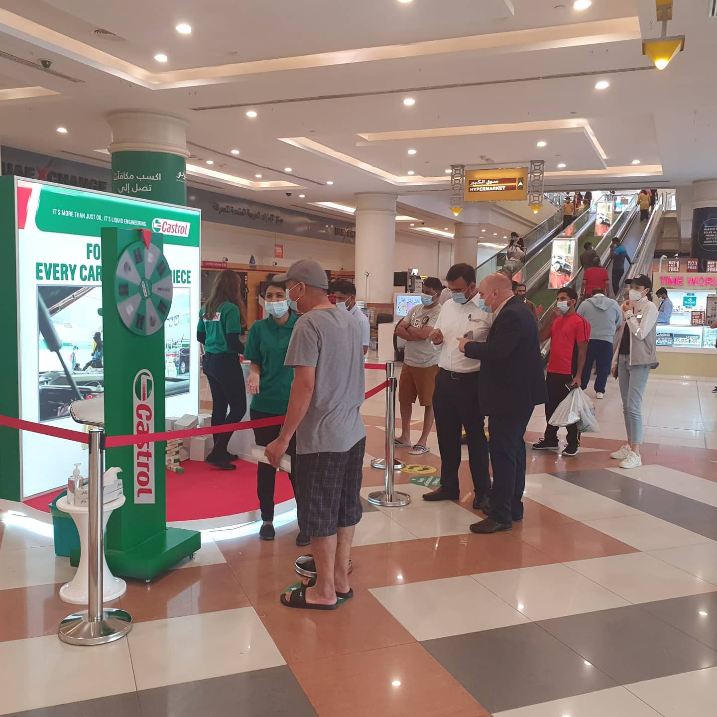 Man rolling picker Wheel in mall