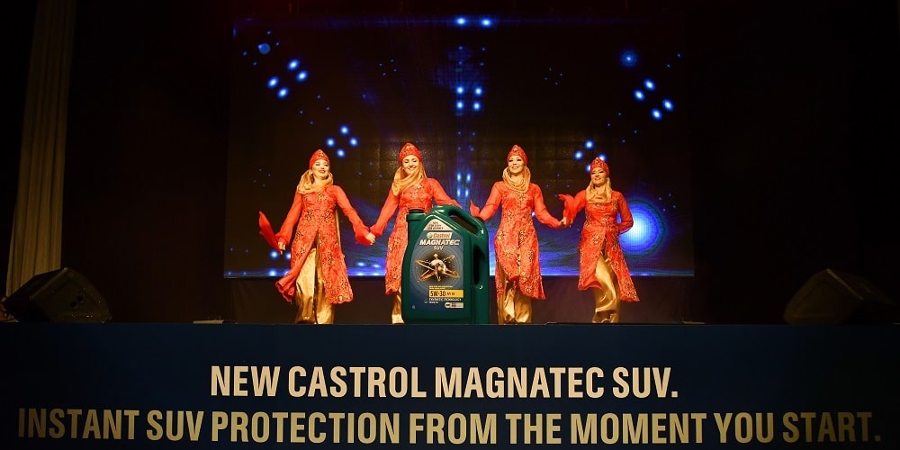 Beautiful girls in orange dress performing traditional dance