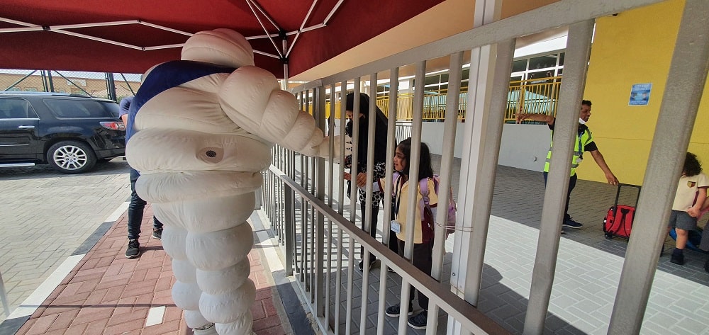 Michelin man plays with children