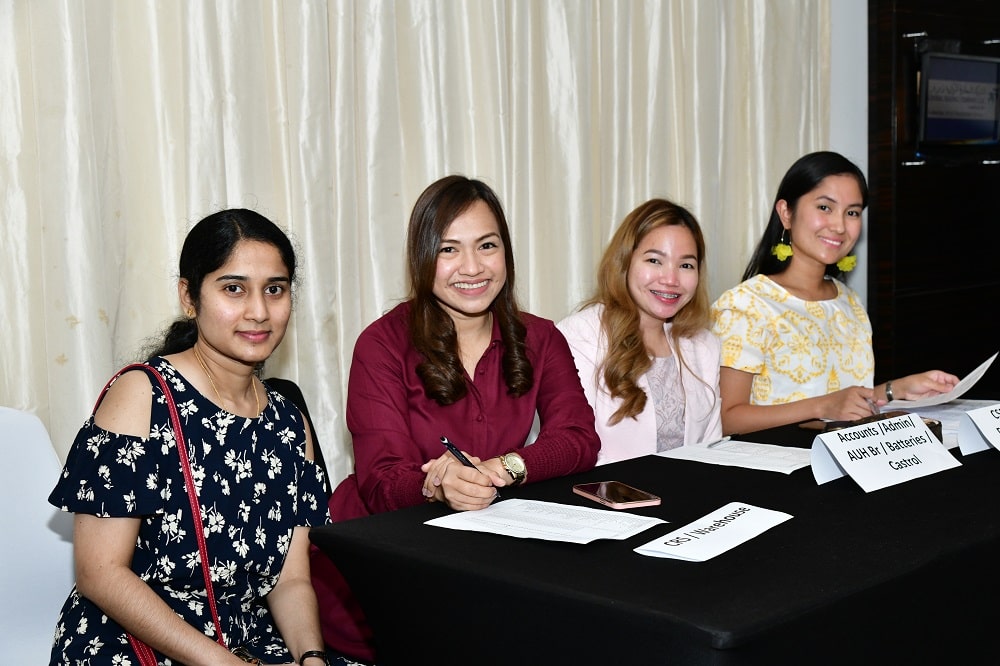 Girls from the CTC admin department smiling for a photo