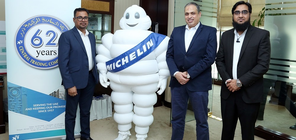 3 handsome men with Michelin statue